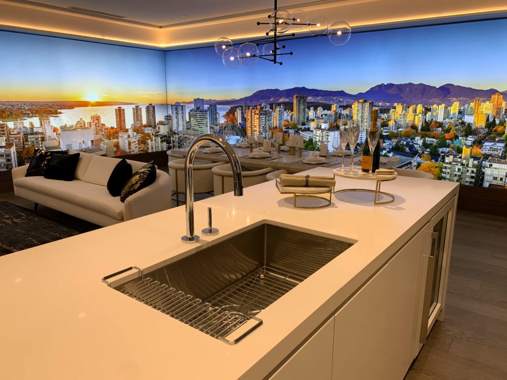pexels-photo-2098451-2098451 Modern kitchen interior with a cityscape backdrop featuring a vibrant skyline at sunset.